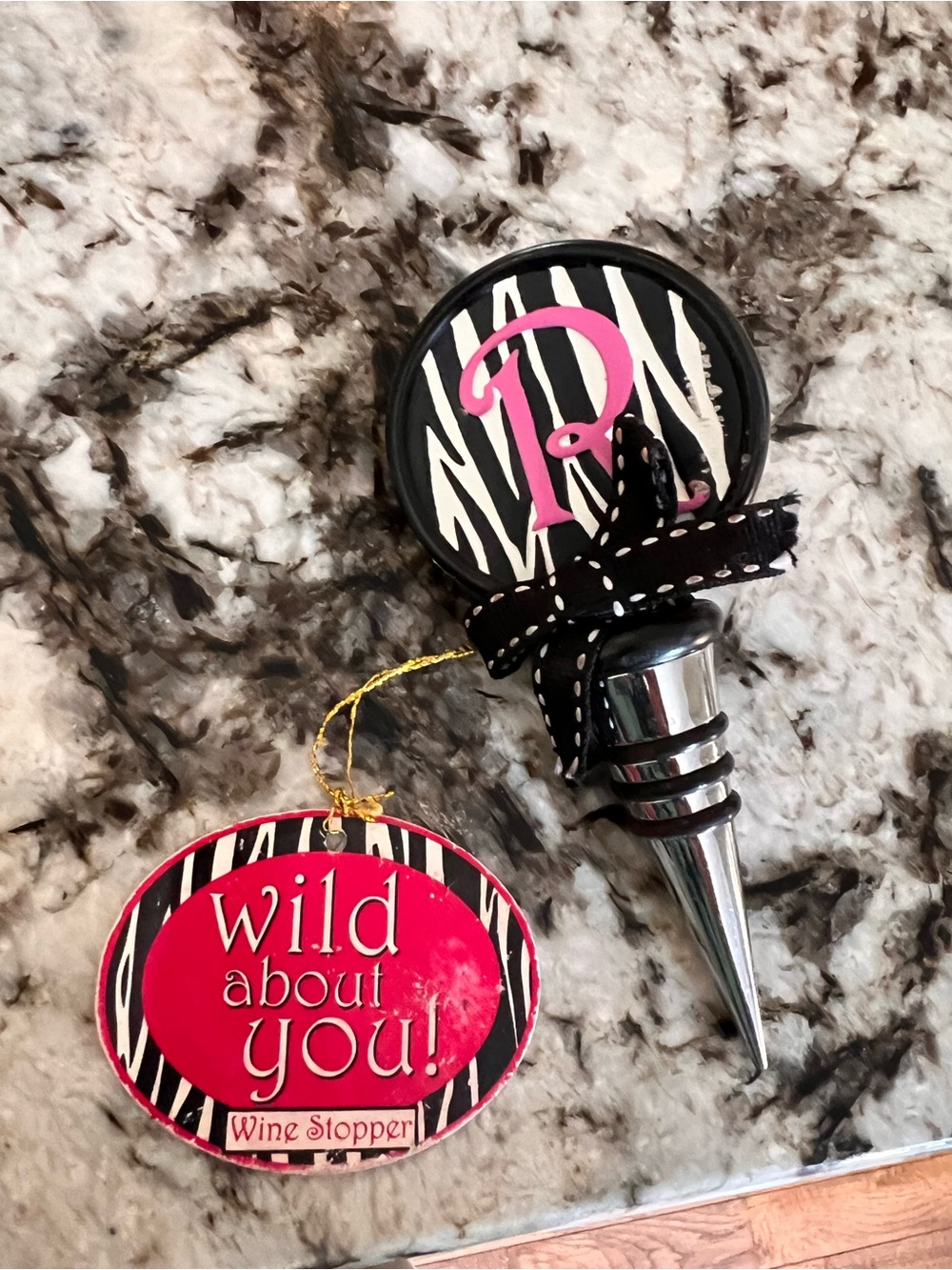 Demdaco ceramic wine and spirits bottle stopper with animal print and monogram